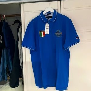 Tommy Hilfiger Blue Polo XL with Italy patch on front and Italy 8 on back